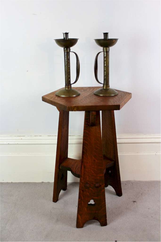 Pair of arts and crafts movement brass candlesticks