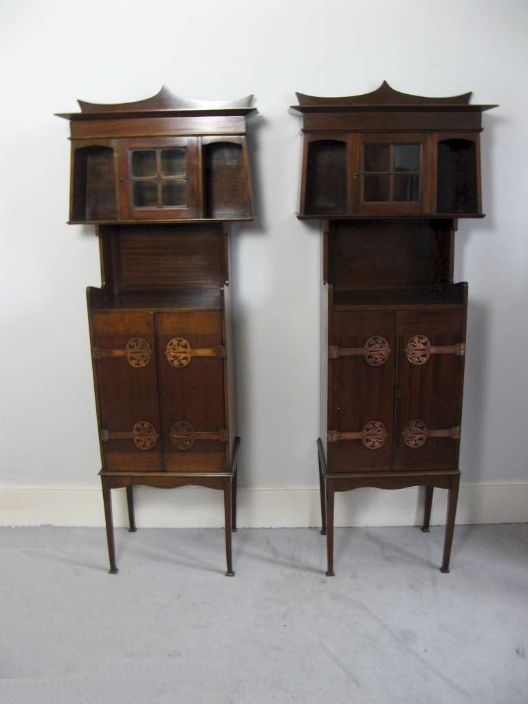  Pair of  mahogany cabinets  J.S Henry