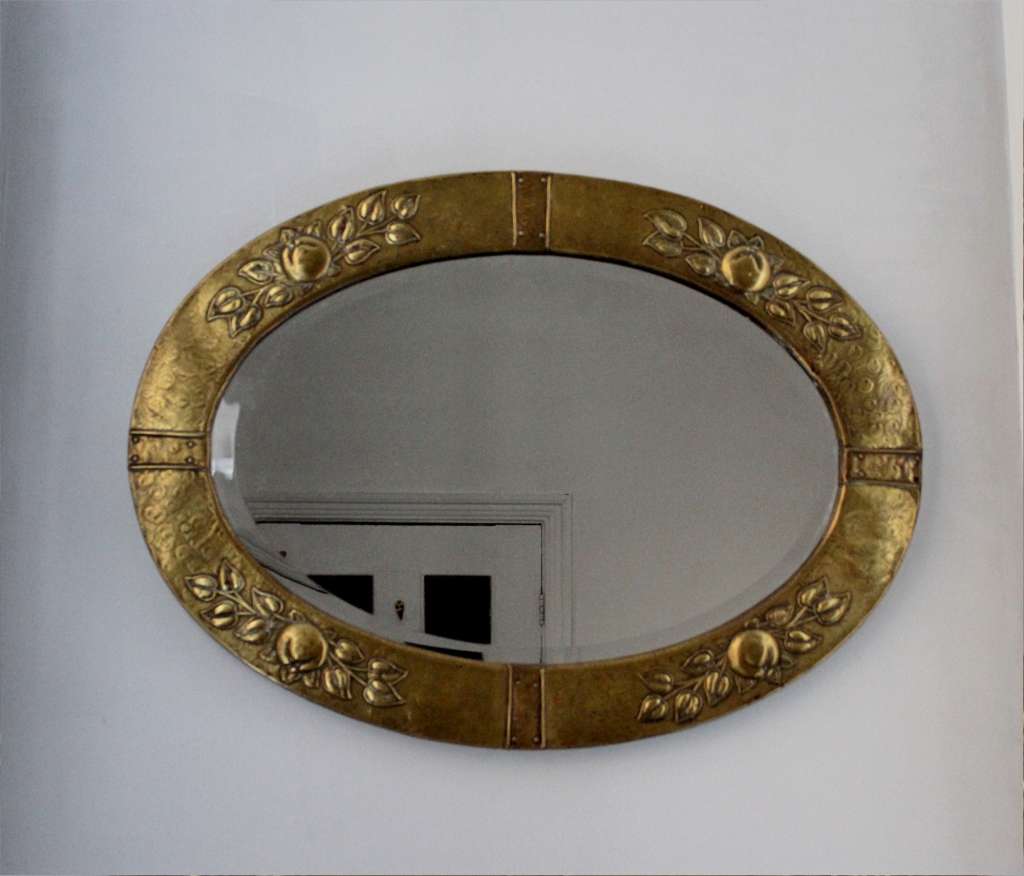 Arts and Crafts brass wall mirror