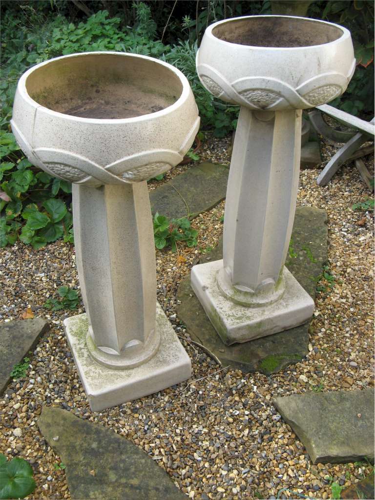 Pair of Arts and Crafts LEFco Ware jardinières and stands