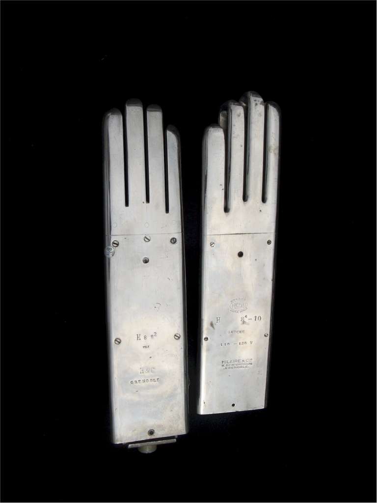 Interesting factory heat moulds in chrome for gloves by Hilaire of Grenoble