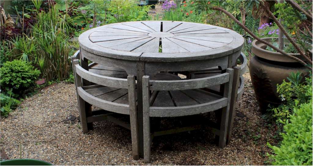 Rare weathered teak garden set by Hughes Bolckow
