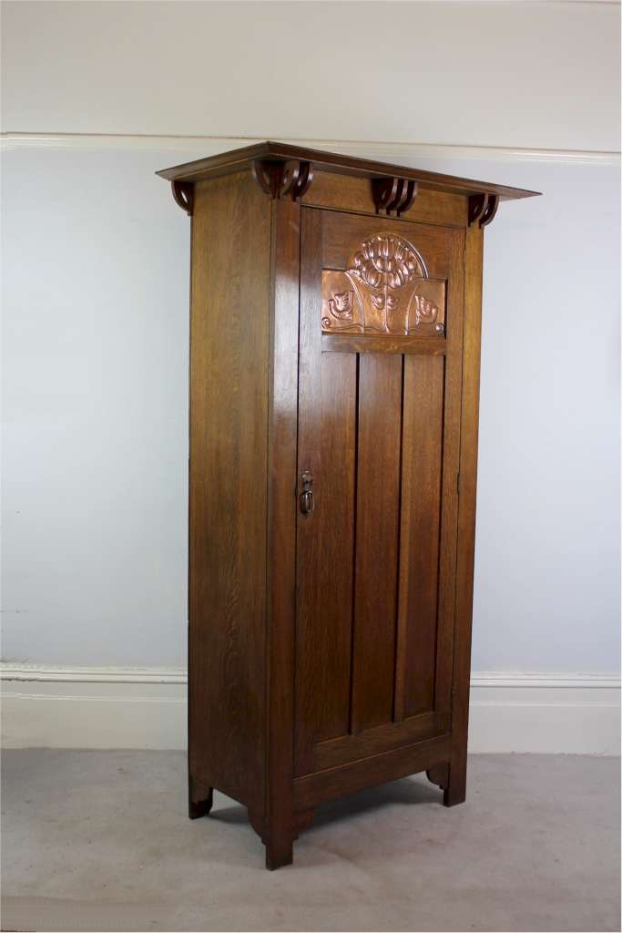Arts and Crafts oak wardrobe by Shapland and Petter of Barnstaple.