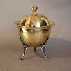 Arts and Crafts brass coal scuttle on iron legs