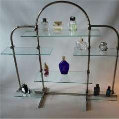 Art Deco chrome shop display stand with adjustable glass shelves