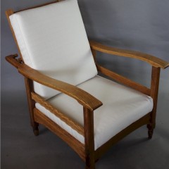 Pair of oak reclining armchairs in the manner of Heals c1920's