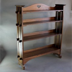Arts & Crafts oak pegged bookcase with pierced heart to gallery