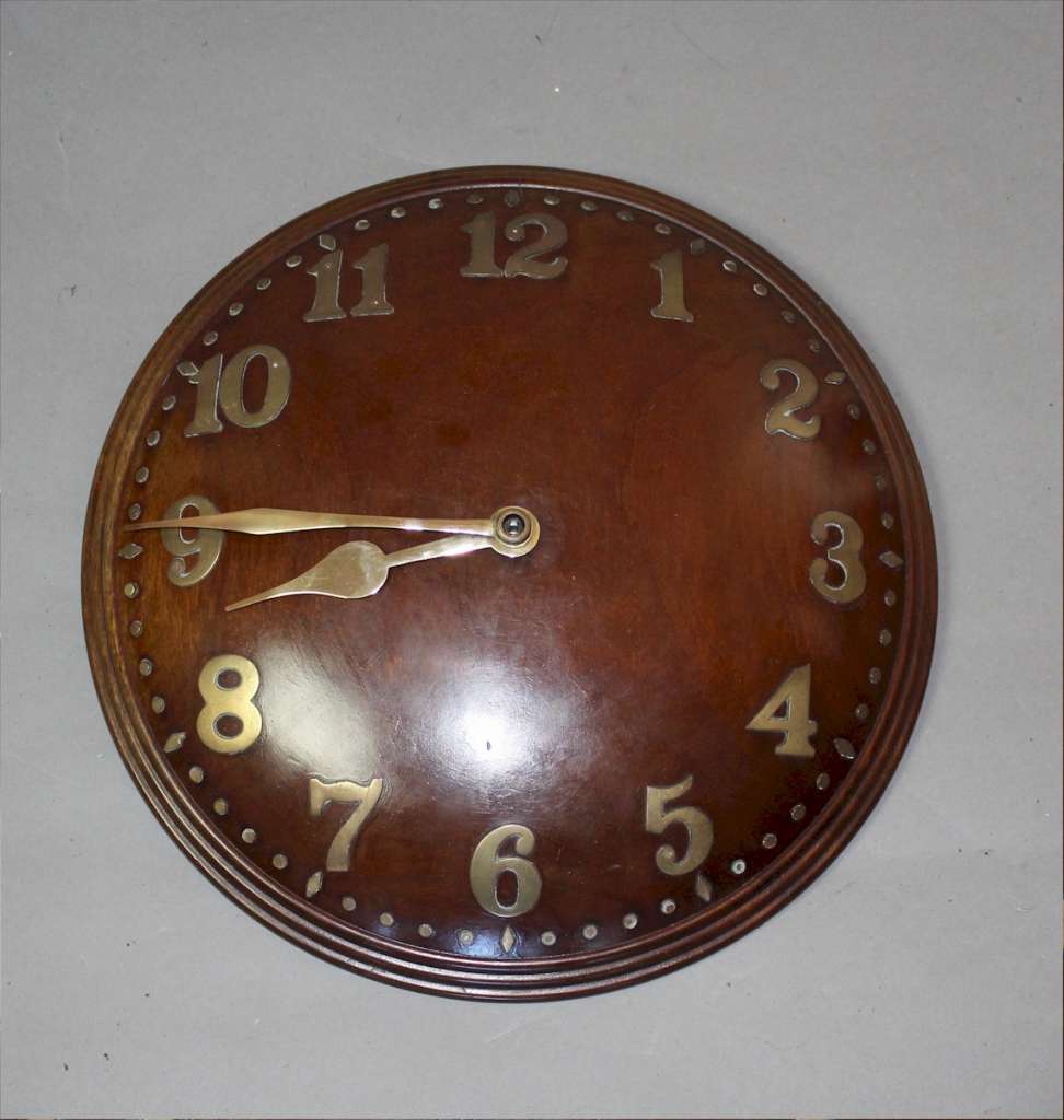 1930's concave  wall clock in walnut with  brass numerals, by Zenith