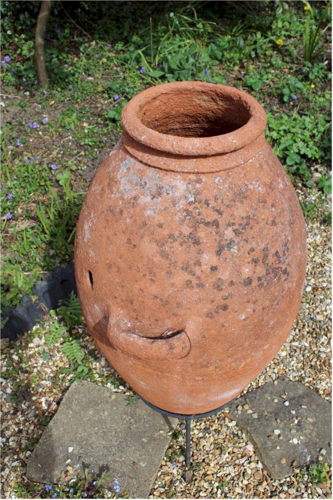 Large terracotta olive oil garden urn