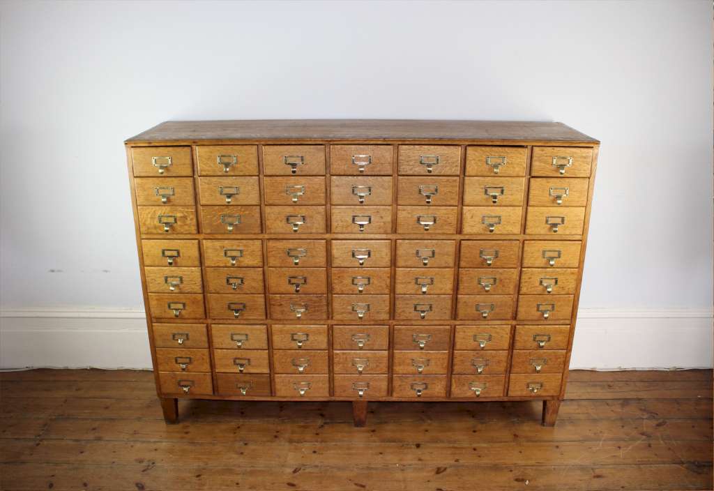 Vintage shop fitting / filing cabinet in solid oak with 63 drawers
