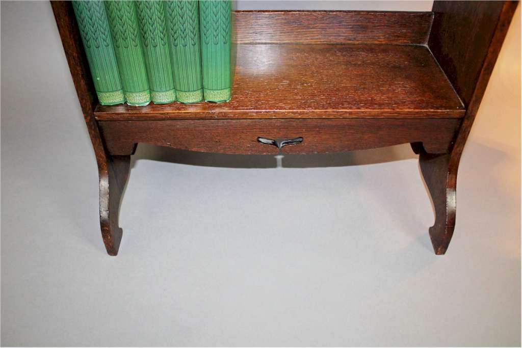 Arts and Crafts side table / bookshelf. c1900