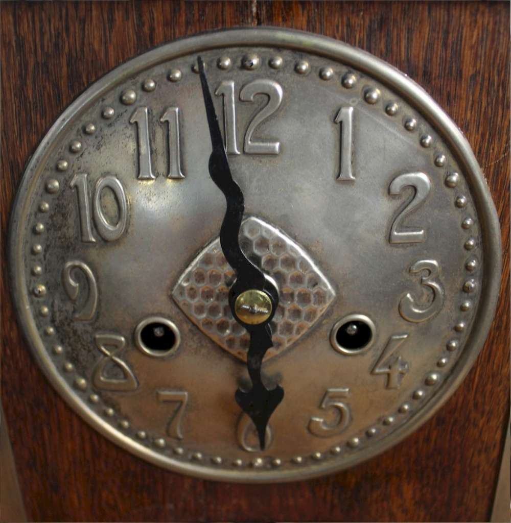 Arts and Crafts oak and metal mantel clock