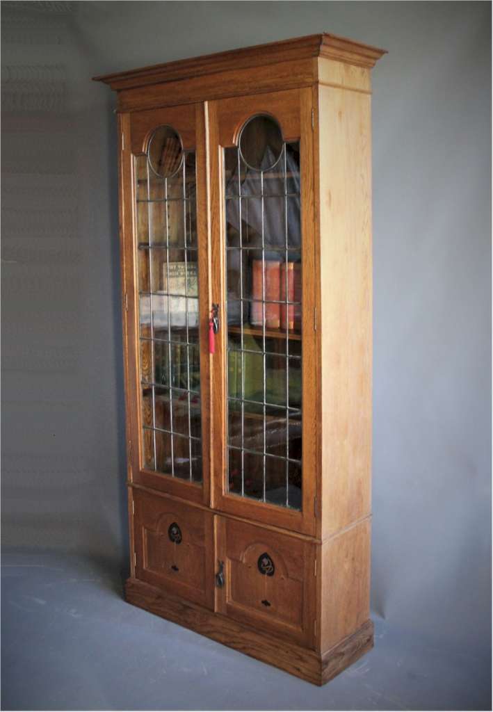 Arts and Crafts glazed bookcase with pewter ebony inlay