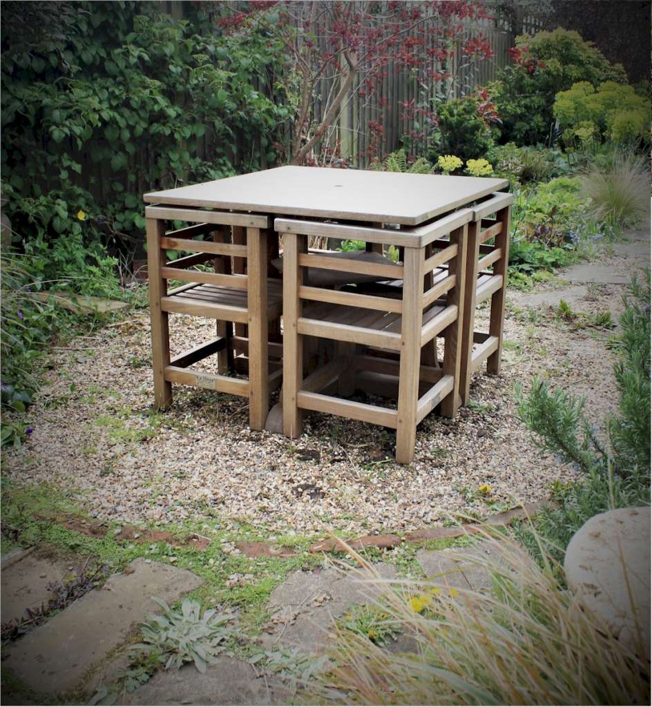 Teak garden table and four corner chairs
