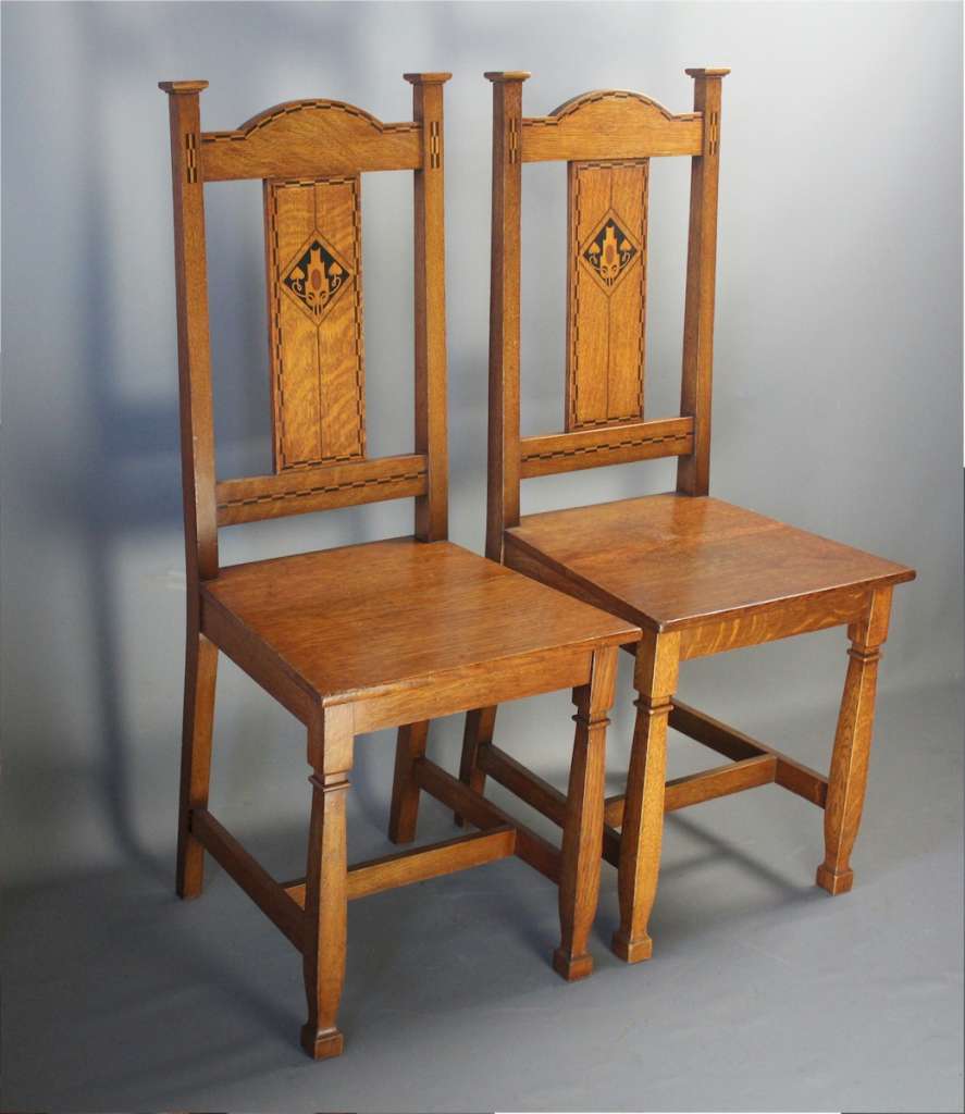 Shapland and Petter pair of oak hall chairs