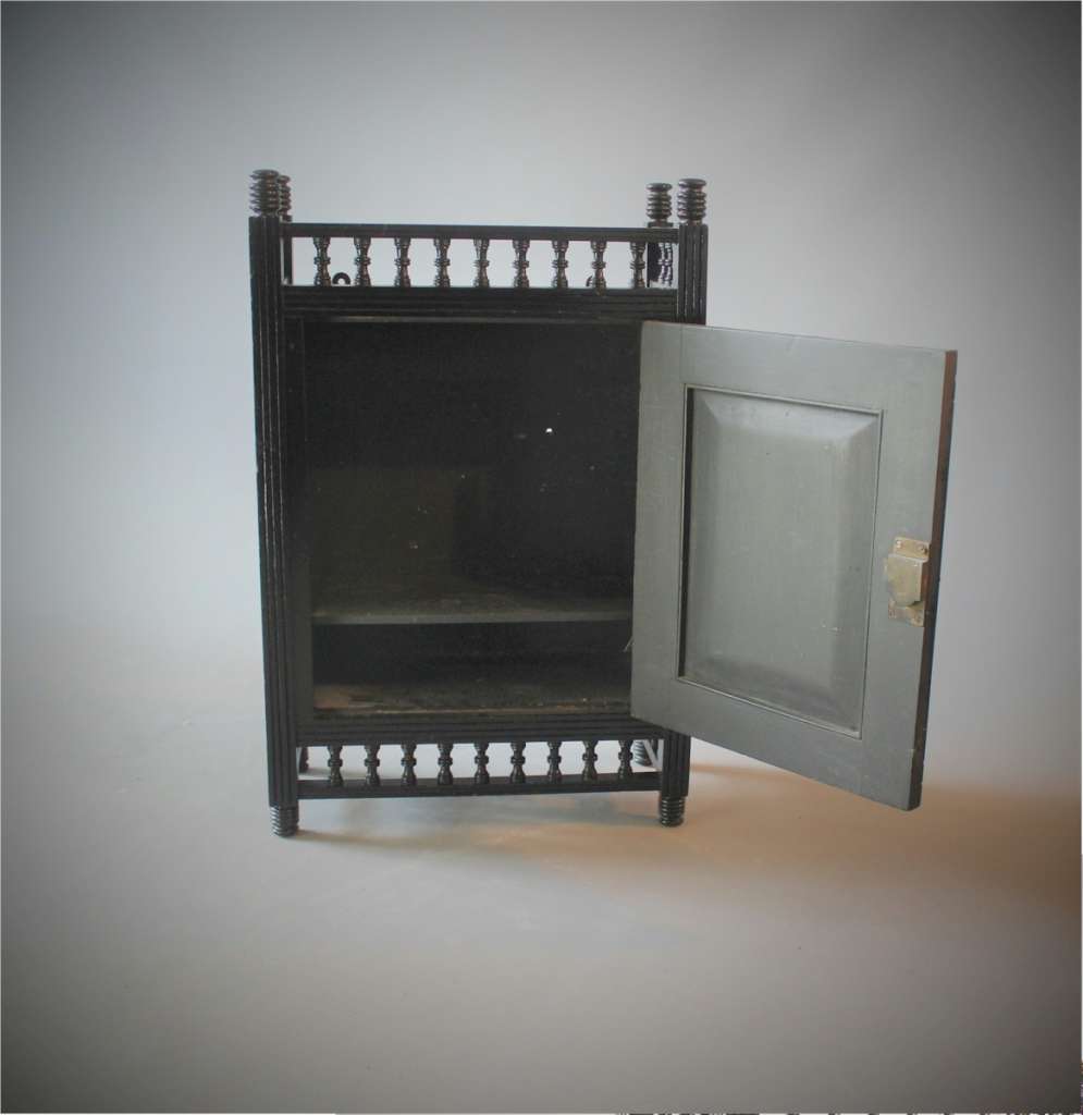 Aesthetic Ebonised wall cabinet with coloured front panel