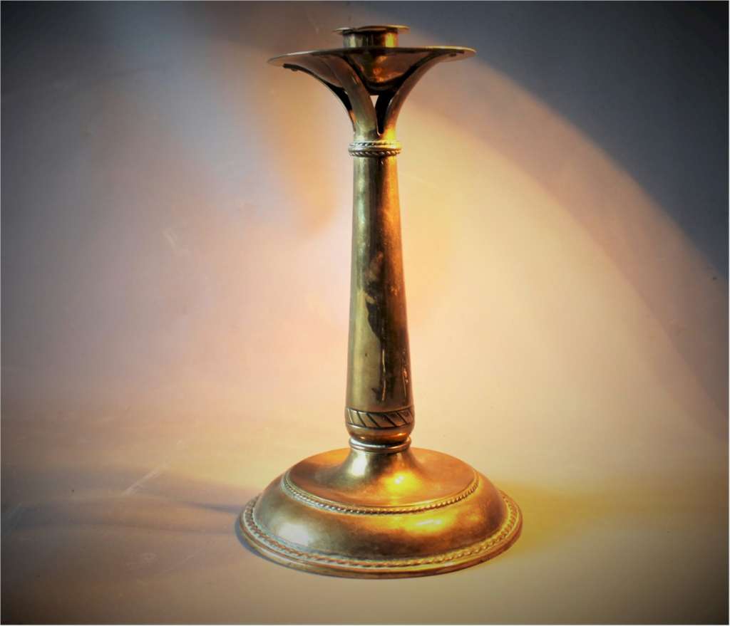 Rare arts and crafts brass candlestick by Alfred Hughes