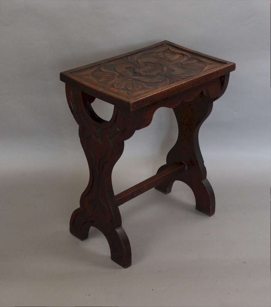Arts and Crafts carved table dated 1903