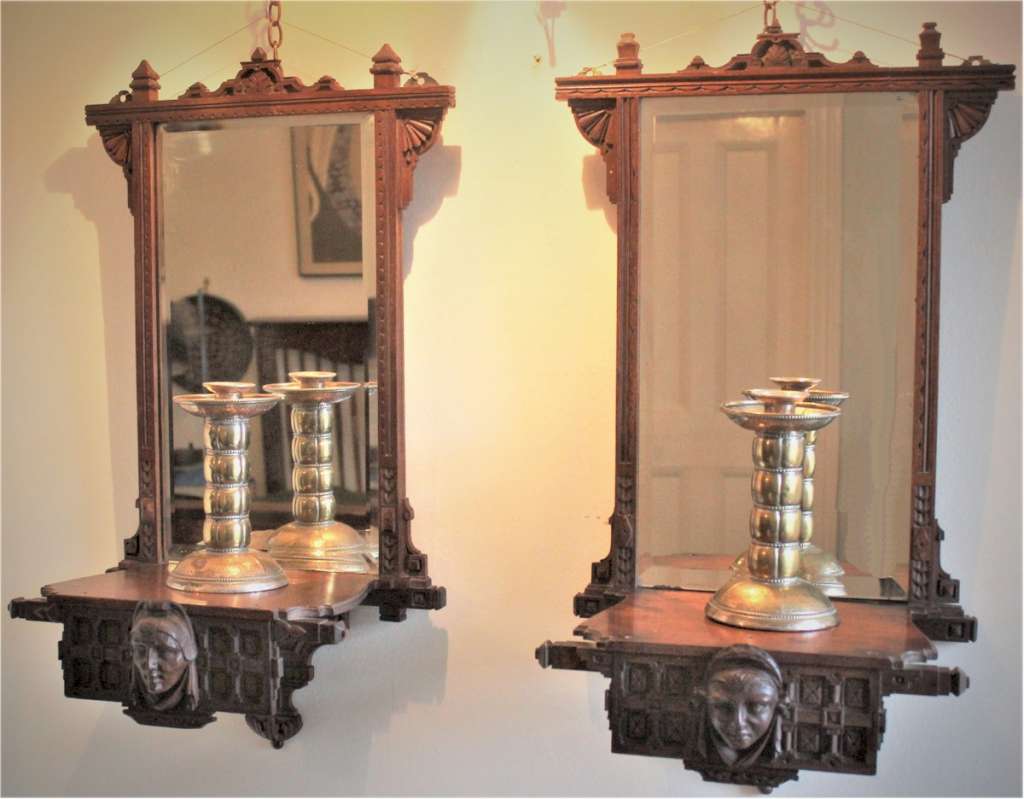 Pair of Aesthetic Movement mahogany mirrored back wall brackets