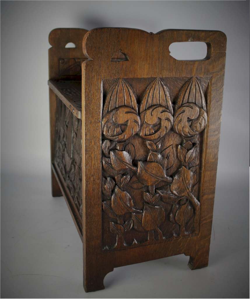 Arts and crafts carved oak slipper box
