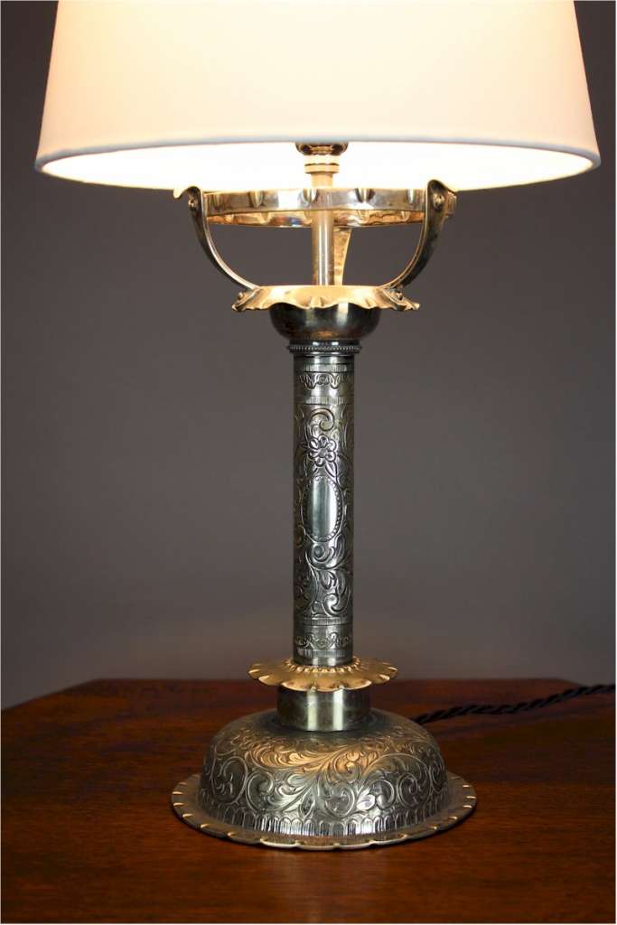 Lovely quality silver plated table lamp with chased decoration