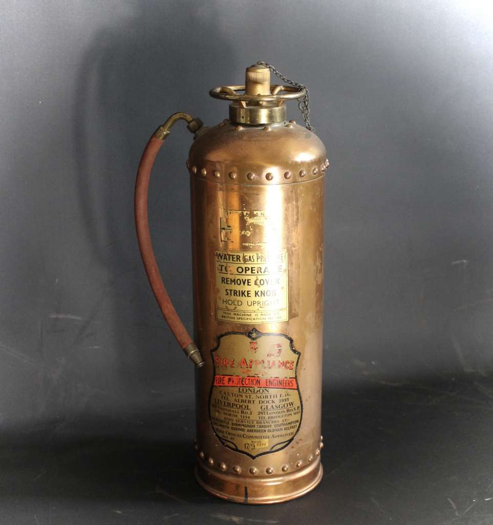 Vintage British copper fire extinguisher.