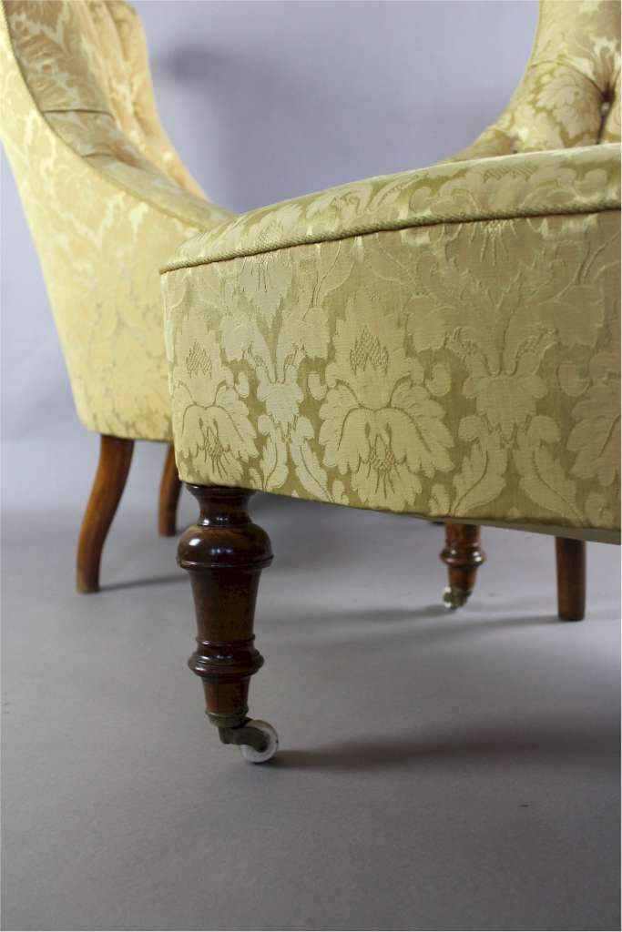 Pair of Victorian button backed armchairs in gold patterned fabric