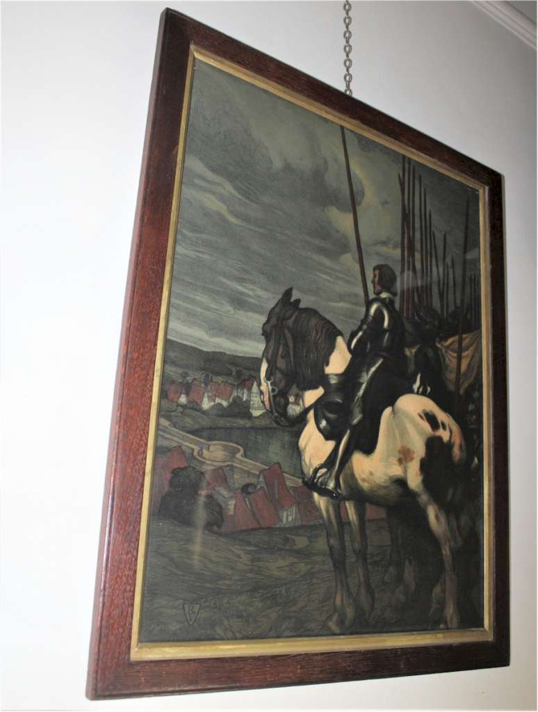 Arts and Crafts oak framed lithograph of a horseman entering a village by A. Jank.
