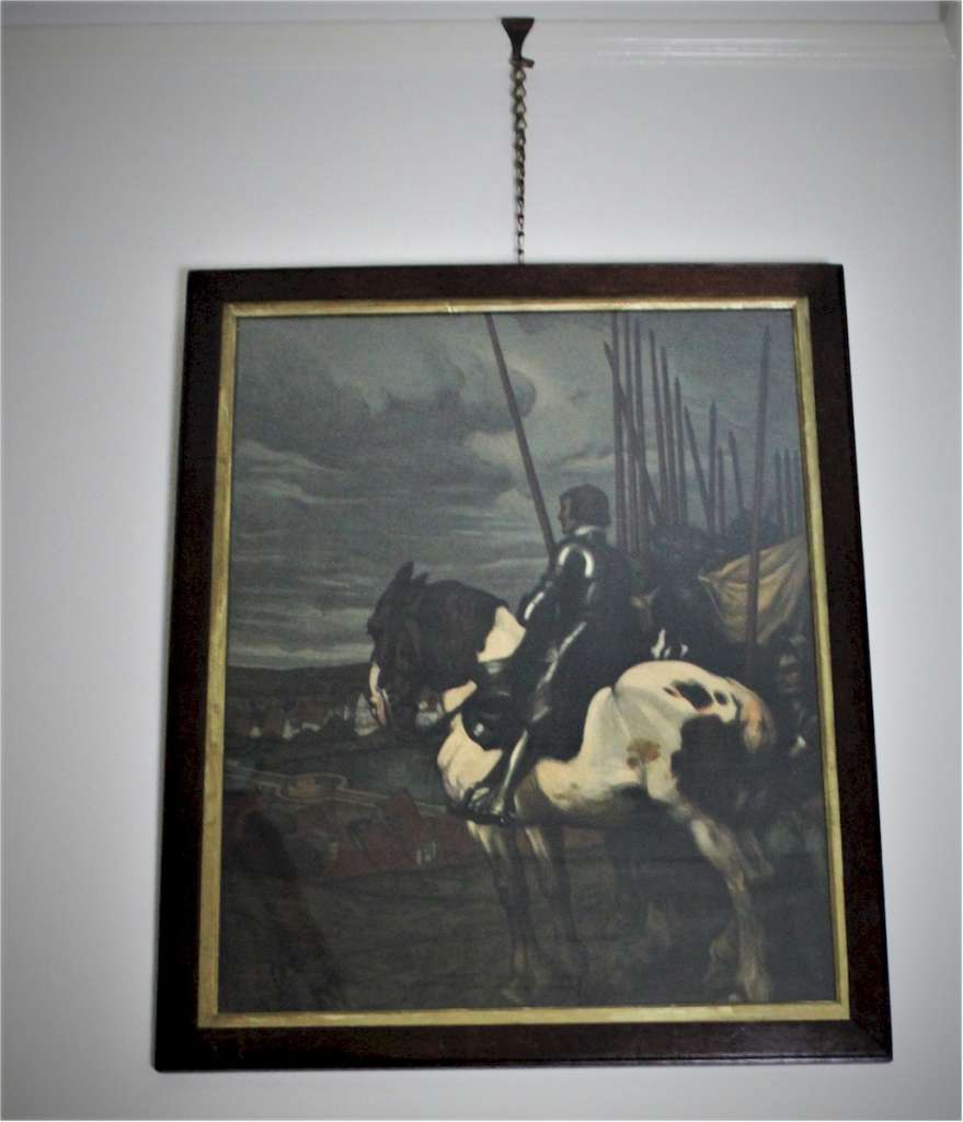 Arts and Crafts oak framed lithograph of a horseman entering a village by A. Jank.