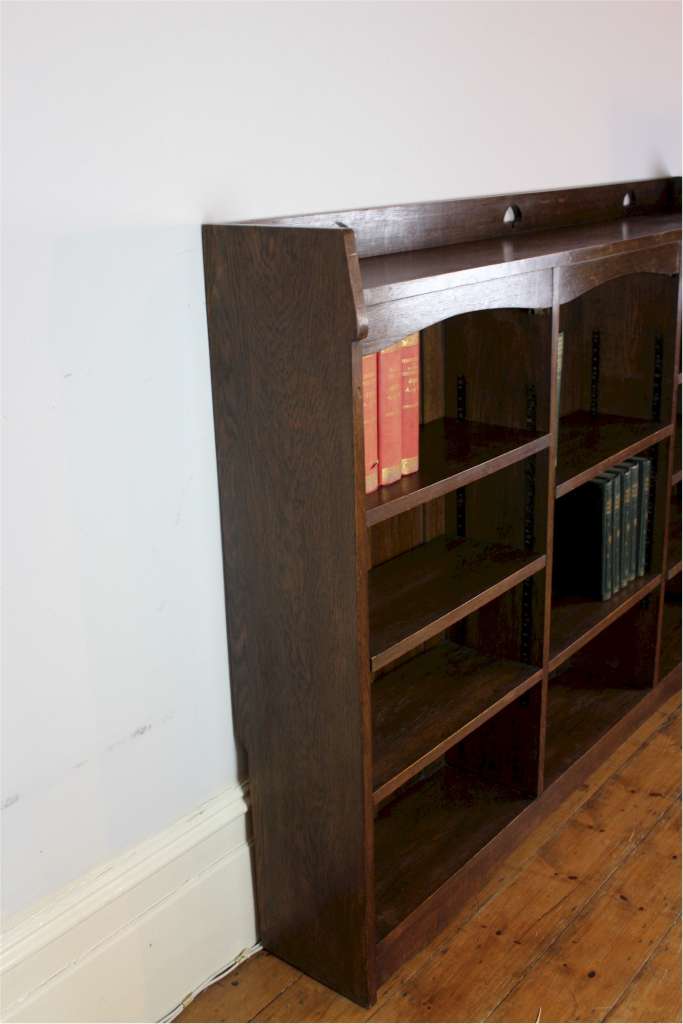 Liberty & Co Arts and Crafts oak open bookcase with pierced heart cut outs