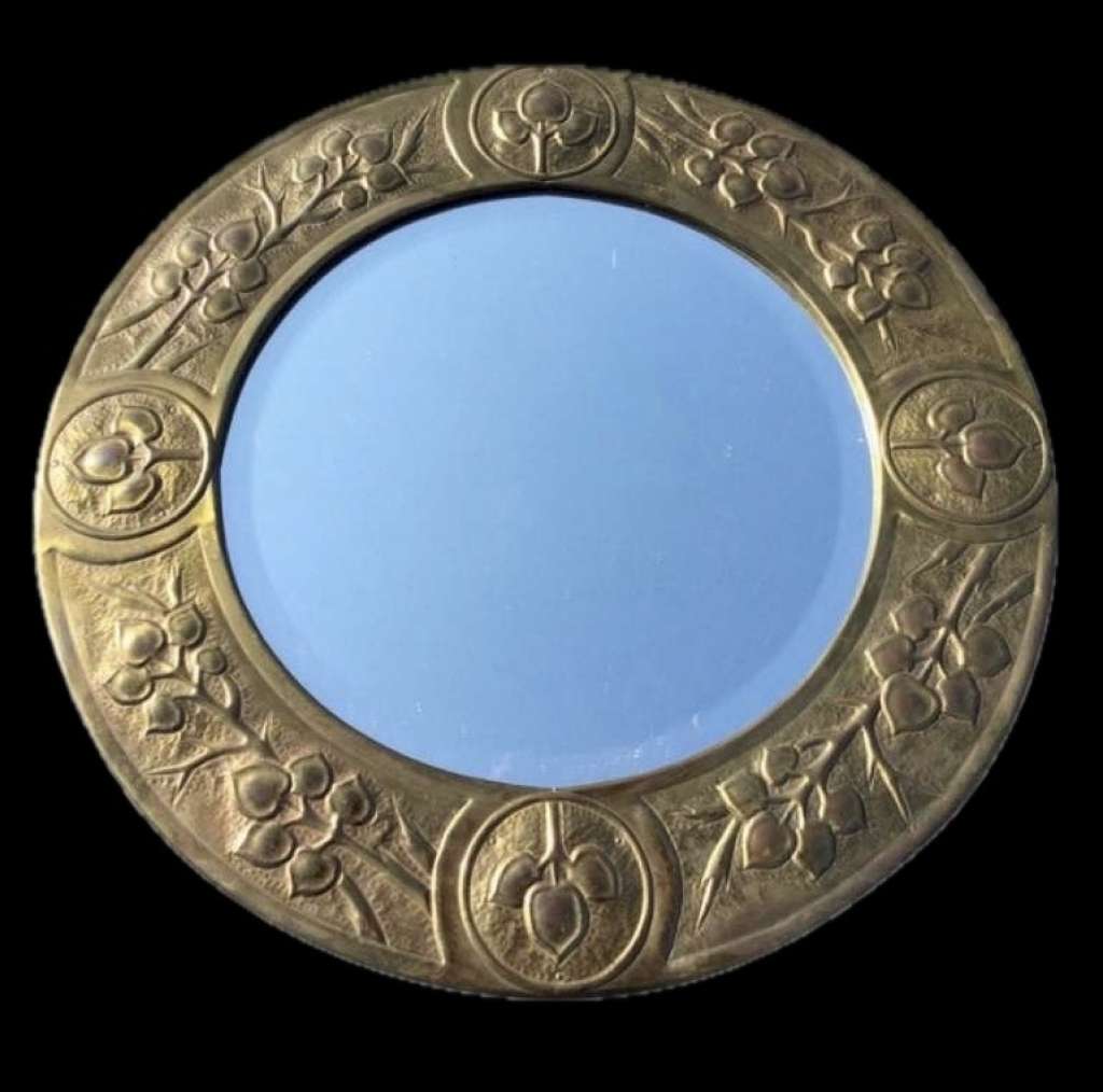 Arts and crafts circular brass wall mirror
