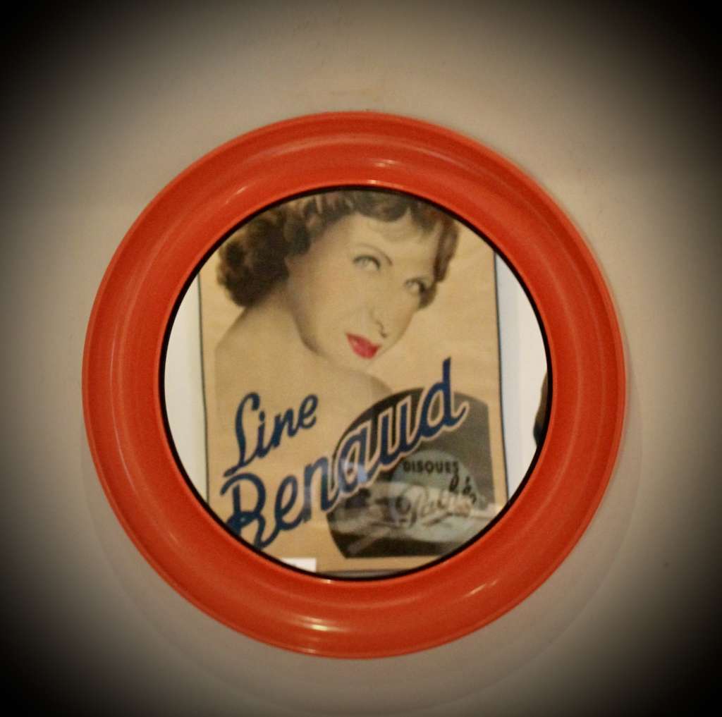 Vintage 1970's Orange round plastic mirror