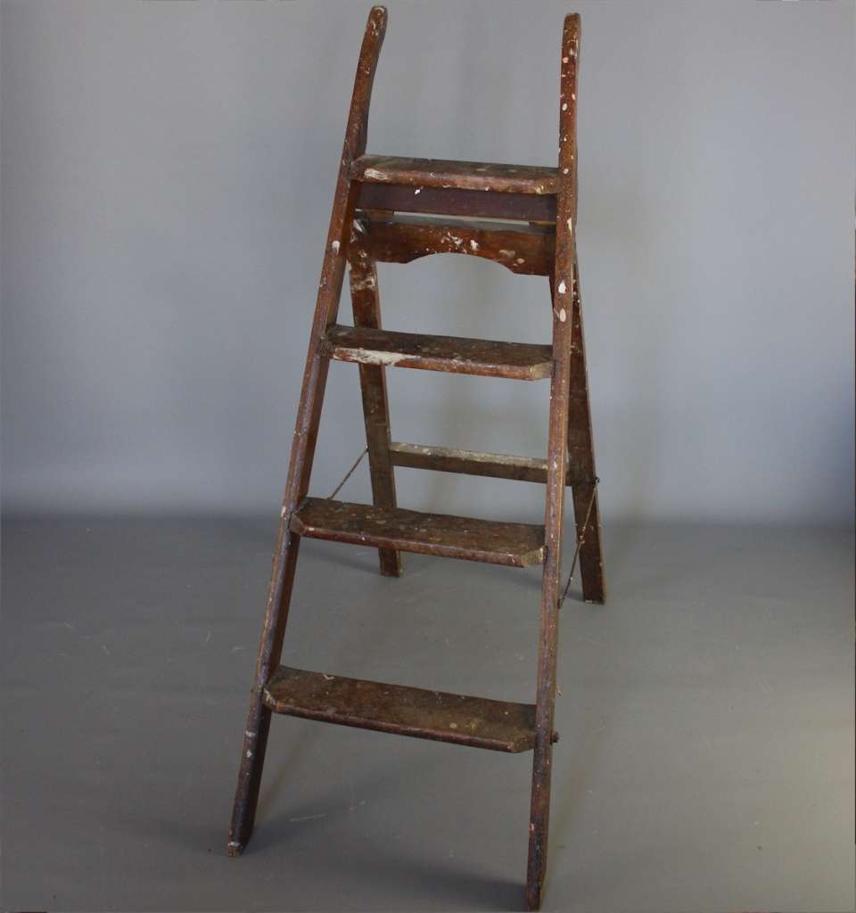 Vintage decorators pitch pine step ladders.
