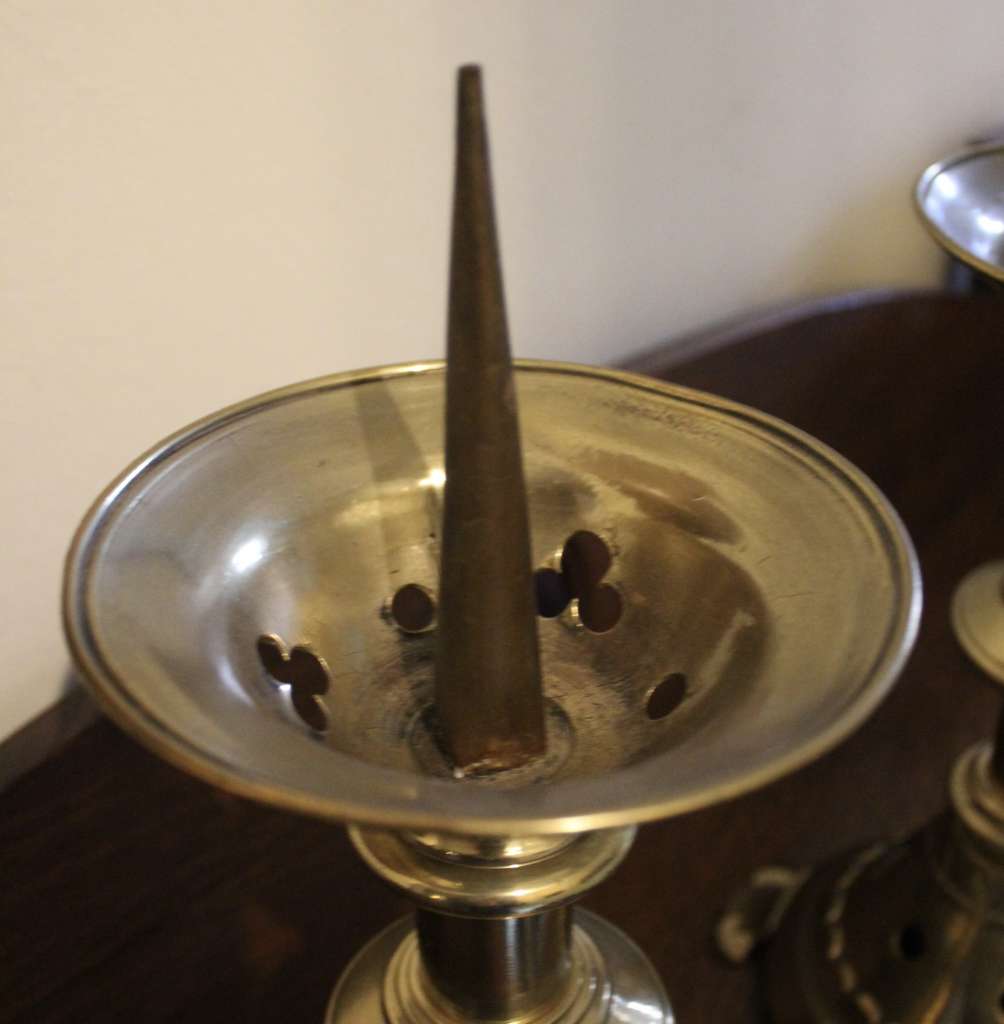 A Pair of Gothic Brass candlesticks
