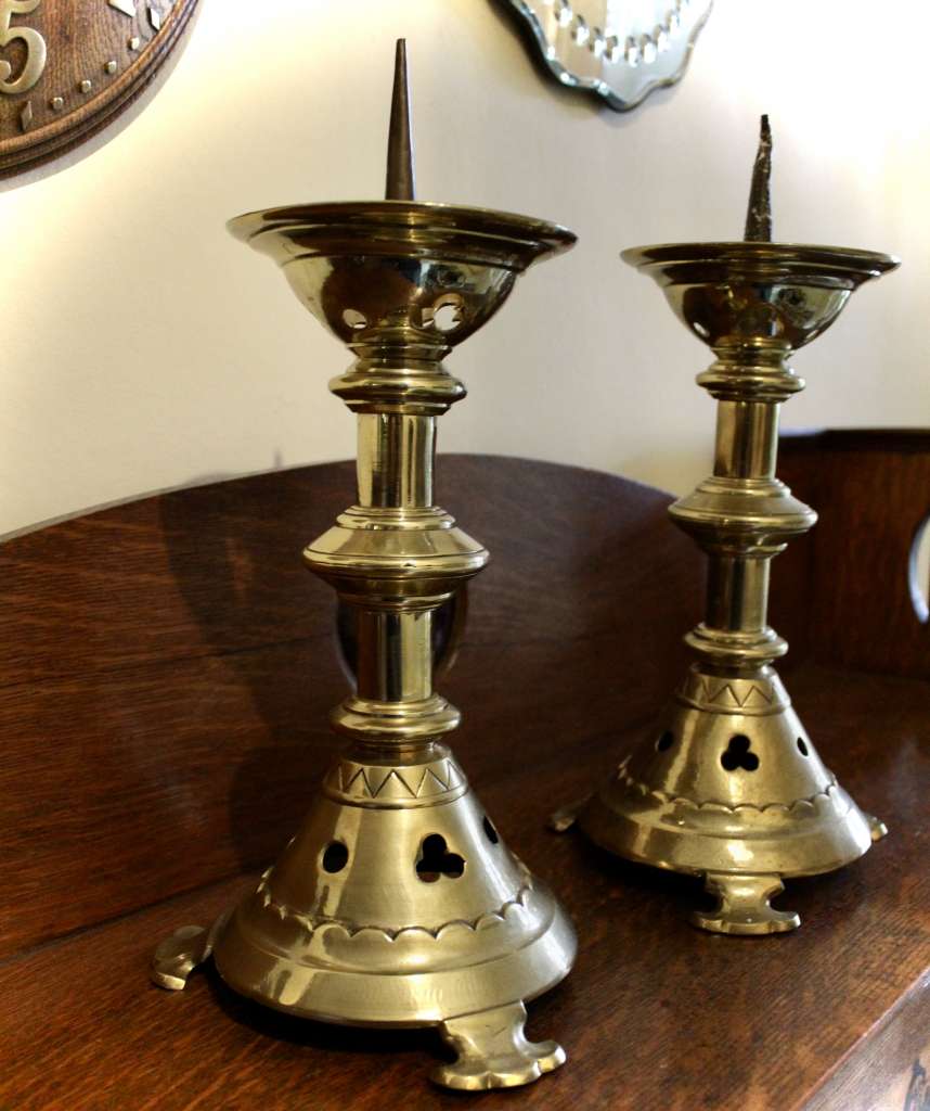 A Pair of Gothic Brass candlesticks