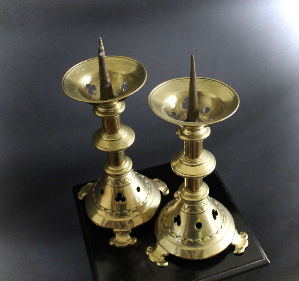 A Pair of Gothic Brass candlesticks