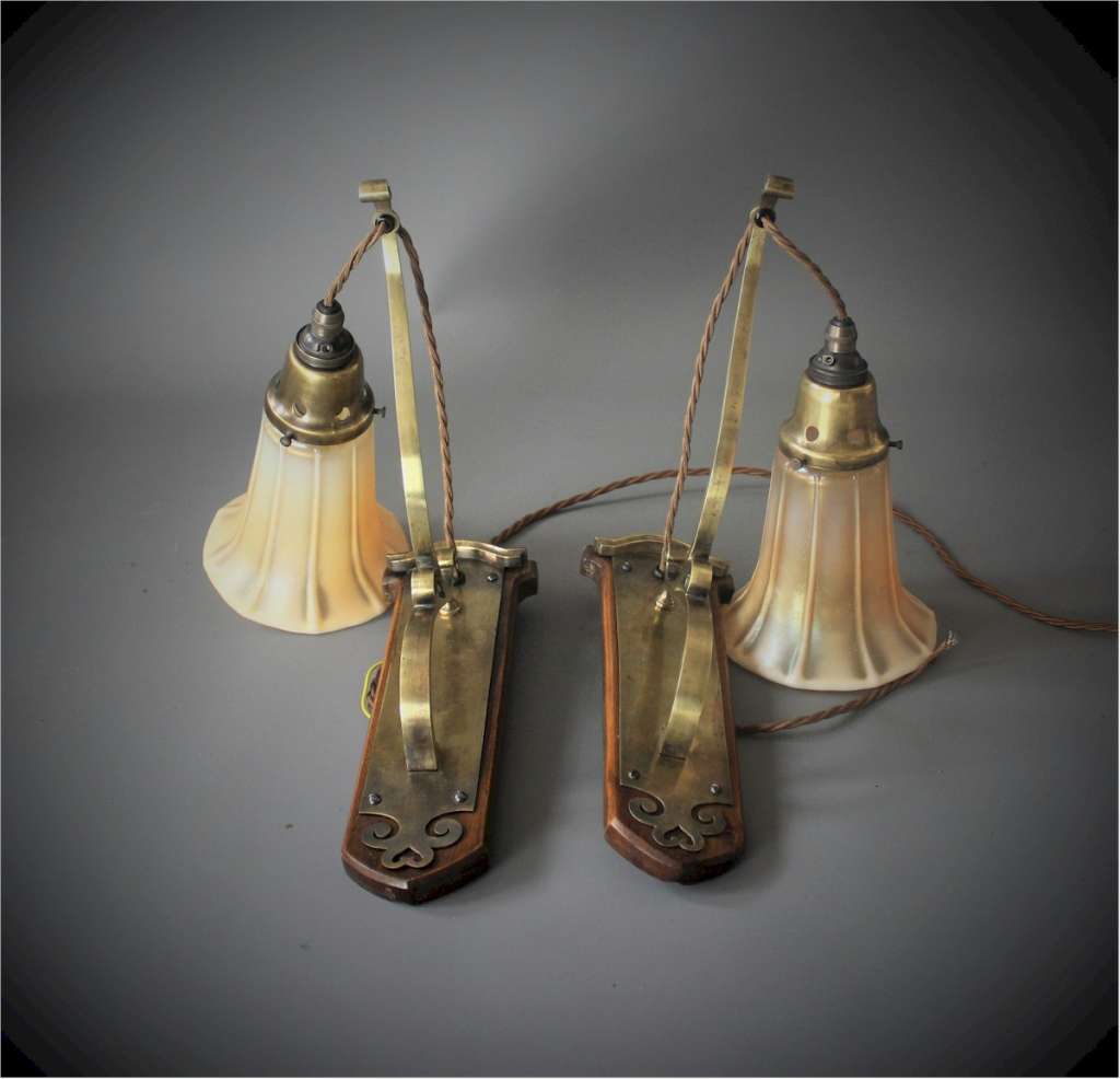 Pair of arts and crafts wall lights.