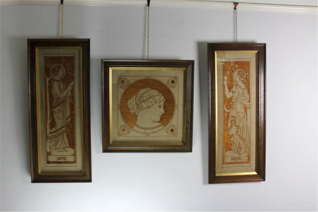 Three art nouveau embroidered panels in oak frames after Selwyn Image