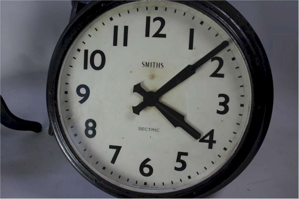 Large Industrial clock by Smiths in metal frame