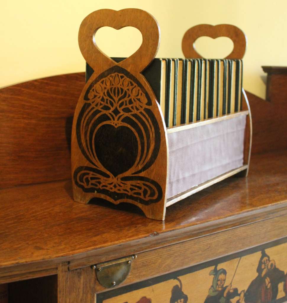Arts and Crafts stencilled book trough in oak