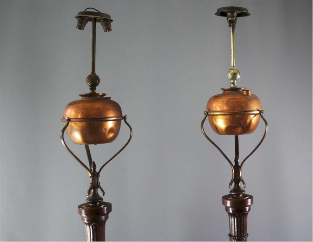 Tall pair of mahogany floor lamps
