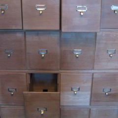 Oak sectional filing cabinet with brass pulls