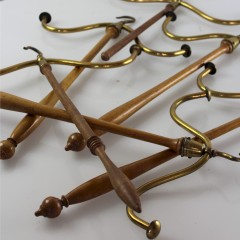 Set of four brass and beech barristers wig and gown hangers
