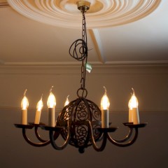 Large arts and crafts iron ceiling lamp with six branches. c1900