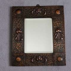 Copper arts and crafts mirror . Measures 15.75 in x 13.75 in x 0.375 in