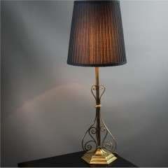 Edwardian brass table lamp with scroll supports