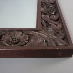 Arts and crafts period carved mirror