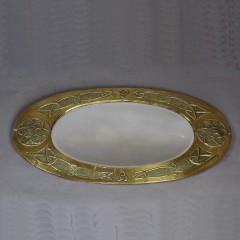 Arts and Crafts oval brass mirror with Celtic Knot design