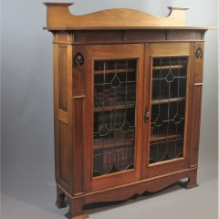 Arts and Crafts pewter and Ebony inlaid bookcase