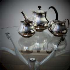 Silver plated tea set designed by Eric Clements for Elkington & Co.